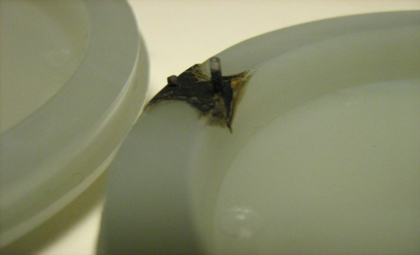 burn marks on a plastic part